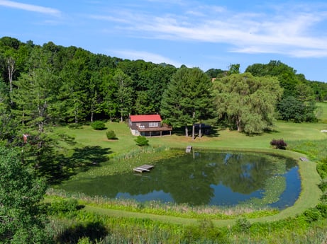 An image featuring water, cloud, sky, plant, water resources, mountain, tree, natural landscape, highland, lake at 735 Midnight Ln.