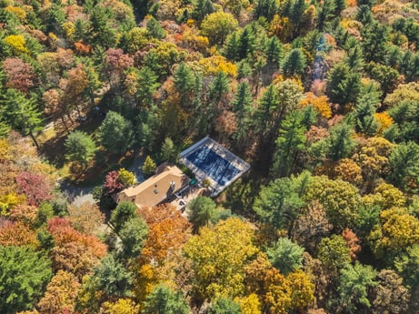 An image featuring plant, plant community, building, tree, natural landscape, sunlight, woody plant, landscape, house, forest at 125 Rimstone Ct.