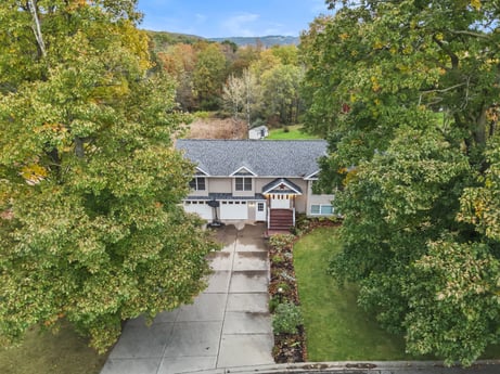 An image featuring plant, building, window, house, tree, sky, vegetation, natural landscape, cottage, cloud at 74 Susquehannock Trail.