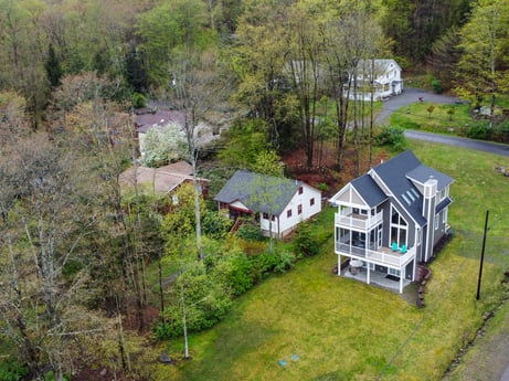An image featuring plant, building, tree, natural landscape, window, land lot, vegetation, house, grass, groundcover at 103 Mokoma Ave.