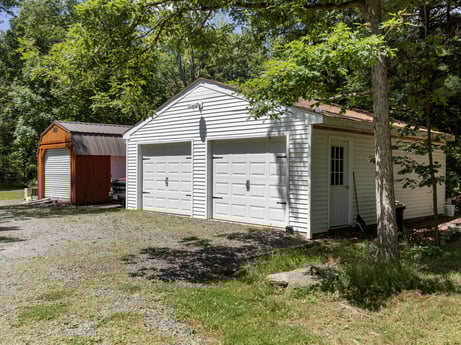 An image featuring plant, property, building, window, tree, land lot, door, house, wood, siding at 145 Nichols Ln.