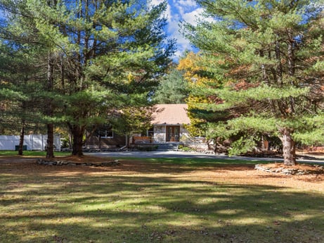 An image featuring plant, sky, larch, building, natural landscape, tree, land lot, shade, grass, house at 125 Rimstone Ct.