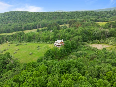 An image featuring sky, plant, plant community, green, natural landscape, tree, cloud, mountain, land lot, grassland at 1761 Brick House Rd.