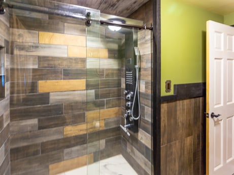 An image featuring building, door, wood, fixture, flooring, floor, hardwood, glass, house, composite material at 491 Hillcrest Dr.