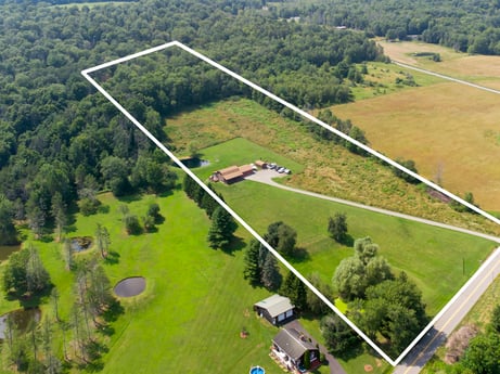 An image featuring property, ecoregion, tree, natural landscape, natural environment, land lot, slope, grass, grassland, plain at 6583 N Rome Rd.