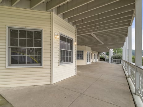 An image featuring property, building, window, wood, shade, facade, real estate, residential area, roof, siding at 218 Point Rd.