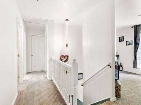 An image featuring wood, fixture, interior design, floor, flooring, comfort, door, hardwood, real estate, wood stain at 105 Thomas St.