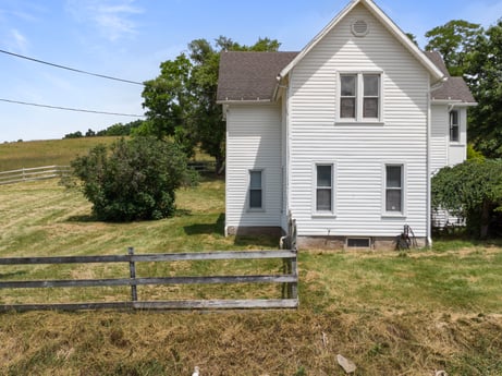 An image featuring sky, building, property, window, plant, cloud, house, tree, land lot, door at 1863 Sopertown Rd.