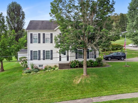 An image featuring plant, building, sky, window, tree, house, architecture, land lot, grass, car at 105 Thomas St.