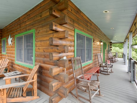 An image featuring property, building, window, wood, lighting, porch, interior design, wood stain, house, floor at 1761 Brick House Rd.