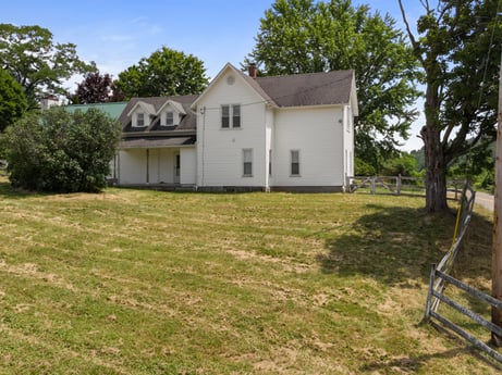 An image featuring sky, plant, building, window, tree, house, land lot, cottage, grass, siding at 1863 Sopertown Rd.