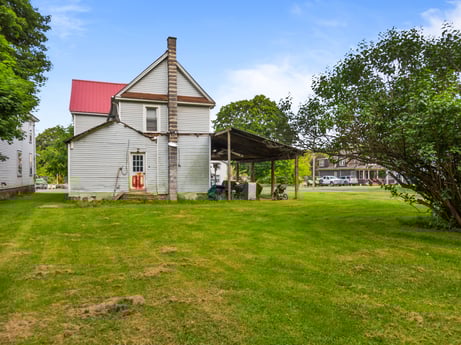 An image featuring sky, cloud, plant, property, building, window, natural environment, tree, door, land lot at 138 T-329.