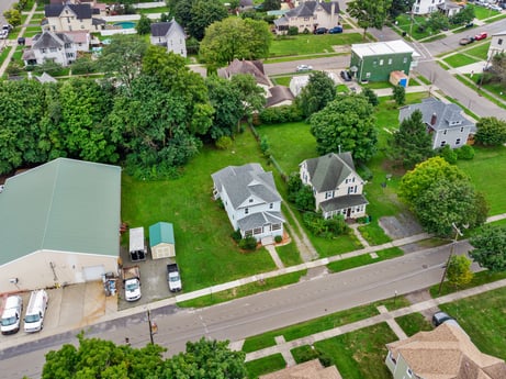 An image featuring plant, property, green, building, land lot, urban design, grass, neighbourhood, house, residential area at 203 Harrison St.