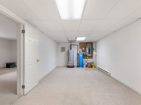 An image featuring fixture, building, flooring, hall, ceiling, room, daylighting, apartment, engineering, city at 276 Mountain View Ln.