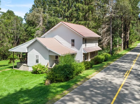 An image featuring plant, tree, land lot, vegetation, cottage, grass, residential area, house, real estate, rural area at 1039 Old Bernice Rd.