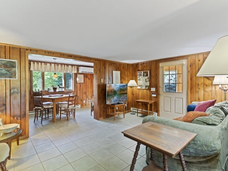 An image featuring table, furniture, azure, wood, chair, interior design, floor, flooring, fixture, hardwood at 130 Haighs Pond Rd.