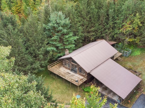 An image featuring plant, plant community, natural landscape, tree, wood, biome, larch, landscape, evergreen, motor vehicle at 125 Marcy Rd.