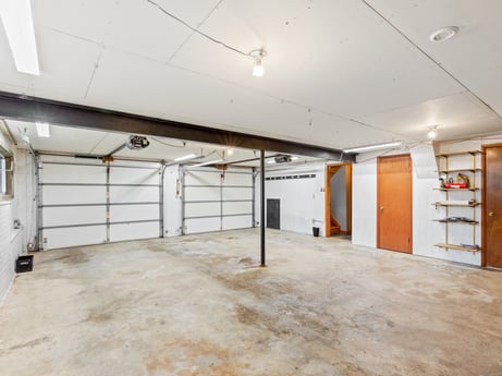 An image featuring hall, floor, wood, flooring, ceiling, hardwood, door, fixture, beam, glass at 491 Hillcrest Dr.