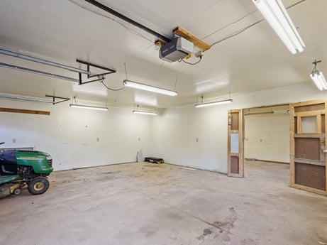 An image featuring wheel, tire, building, wall, floor, flooring, wood, rolling, ceiling, fixture at 2266 Liberty Corners Rd.