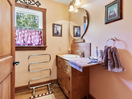 An image featuring mirror, picture frame, cabinetry, property, furniture, building, window, purple, interior design, drawer at 145 Nichols Ln.