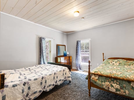 An image featuring furniture, building, fixture, comfort, window, textile, wood, architecture, interior design, floor at 1039 Old Bernice Rd.