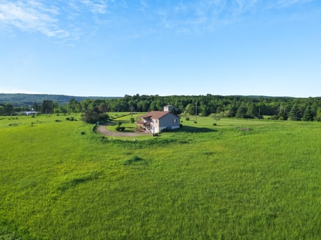 An image featuring cloud, sky, plant, natural landscape, tree, cumulus, grass, grassland, house, landscape at 85 View Rd.