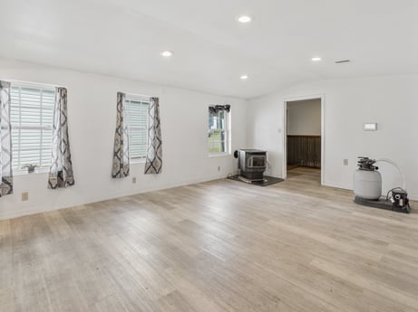 An image featuring wood, building, interior design, window, hall, fixture, flooring, floor, art, laminate flooring at 5442 Clarkstown Rd.