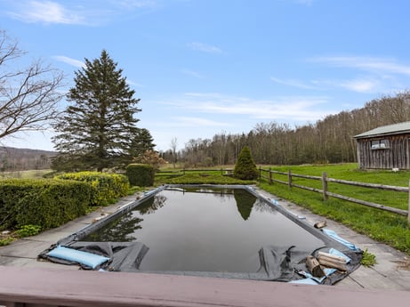 An image featuring plant, cloud, sky, water, water resources, nature, tree, natural landscape, watercourse, architecture at 1569 S Macafee Rd.