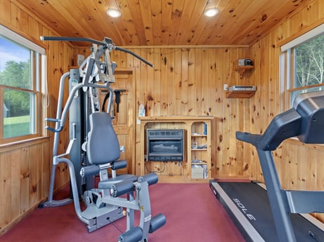 An image featuring property, window, exercise machine, building, wood, interior design, flooring, exercise equipment, floor, hardwood at 130 Haighs Pond Rd.