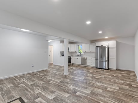 An image featuring fixture, cabinetry, wood, interior design, hall, window, floor, flooring, ceiling, glass at 127 Shore Dr.