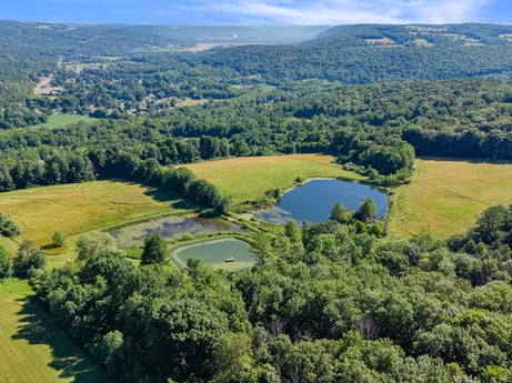 An image featuring water, water resources, sky, cloud, ecoregion, natural landscape, azure, natural environment, highland, body of water at 735 Midnight Ln.