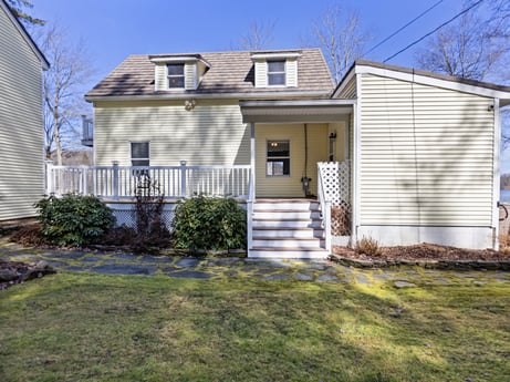 An image featuring plant, building, sky, window, tree, house, fixture, land lot, cottage, door at 199 S Lake Rd.