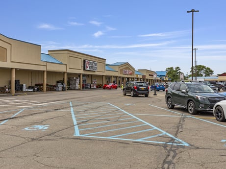 An image featuring cloud, sky, tire, land vehicle, wheel, car, vehicle, infrastructure, motor vehicle, asphalt at 1040 Center St.