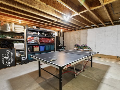 An image featuring table tennis racket, property, table, ping pong, interior design, sports equipment, architecture, floor, tire, flooring at 18 Country View Dr.