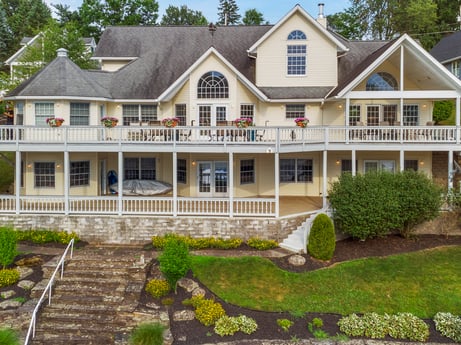 An image featuring plant, building, property, window, house, land lot, tree, fixture, residential area, sky at 218 Point Rd.