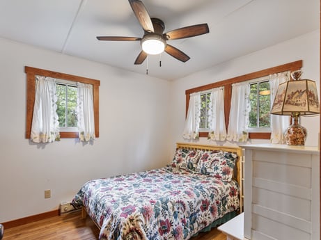 An image featuring property, window, furniture, window blind, ceiling fan, building, wood, cabinetry, interior design, comfort at 103 Mokoma Ave.