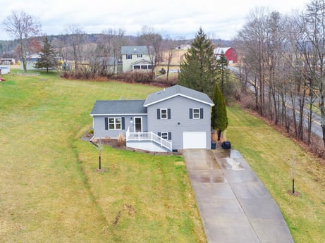 An image featuring plant, building, window, sky, cloud, tree, house, land lot, grass, cottage at 18 Country View Dr.