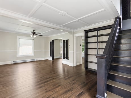 An image featuring property, window, building, fixture, wood, interior design, hall, flooring, floor, real estate at 203 Harrison St.