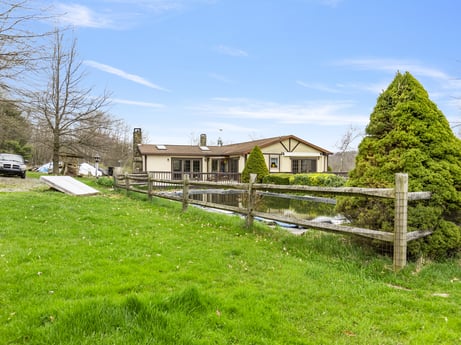 An image featuring cloud, sky, plant, building, property, ecoregion, natural landscape, house, natural environment, tree at 1569 S Macafee Rd.