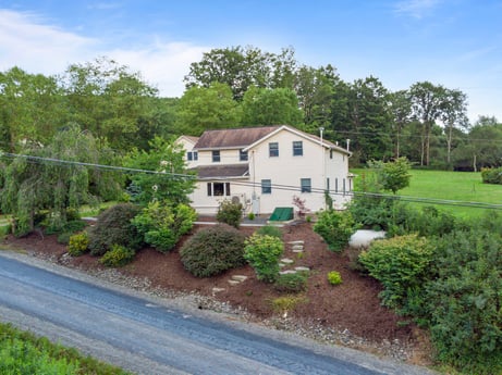 An image featuring plant, sky, building, cloud, window, house, tree, land lot, natural landscape, grass at 130 Haighs Pond Rd.