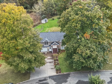 An image featuring plant, building, window, vegetation, house, tree, biome, residential area, neighbourhood, natural landscape at 74 Susquehannock Trail.