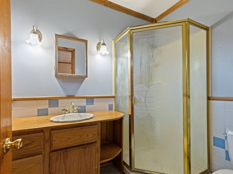 An image featuring mirror, tap, bathroom cabinet, property, sink, plumbing fixture, makeup mirror, furniture, bathroom sink, cabinetry at 2266 Liberty Corners Rd.