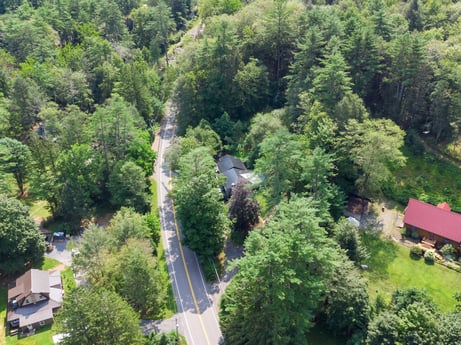 An image featuring plant, tree, urban design, evergreen, landscape, natural landscape, groundcover, shrub, city, road at 9224 PA-87.