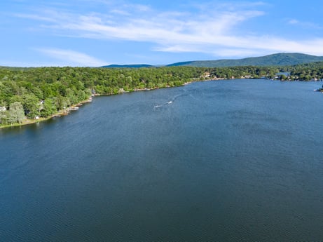 An image featuring water, sky, cloud, natural landscape, lake, coastal and oceanic landforms, river island, lacustrine plain, landscape, horizon at 127 Shore Dr.