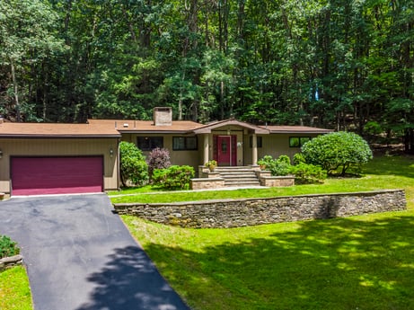 An image featuring plant, property, tree, shade, land lot, grass, building, cottage, shrub, groundcover at 104 Stony Mountain Rd.