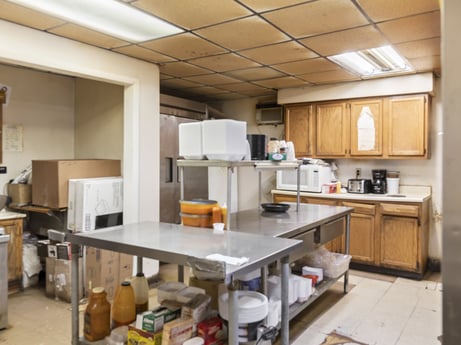 A kitchen at 199 State St featuring: table, furniture, cabinetry, countertop, wood, interior design, kitchen, chair, kitchen appliance, floor