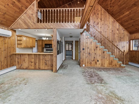 An image featuring window, wood, hall, interior design, floor, flooring, beam, door, real estate, facade at 815 Lakeside Dr.