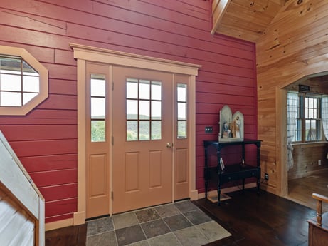 An image featuring window, building, wood, fixture, door, interior design, wood stain, brickwork, wall, siding at 1761 Brick House Rd.