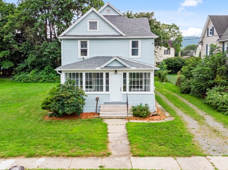 An image featuring plant, building, window, sky, door, cloud, house, tree, land lot, fixture at 203 Harrison St.