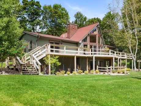 An image featuring plant, building, window, sky, tree, house, porch, cottage, grass, wood at 276 Mountain View Ln.